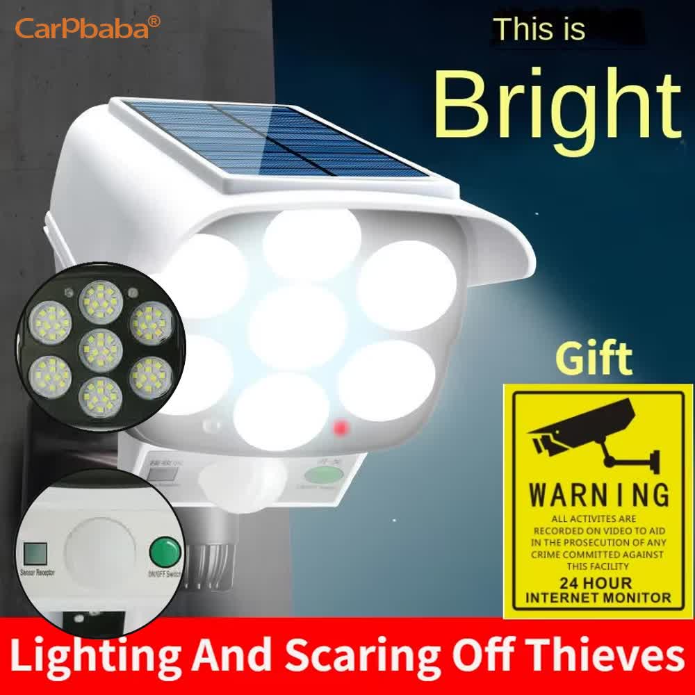 Home Security Flood Lights - 屋外ソーラーライト人感センサーセキュリティダミーカメラワイヤレス投光器IP65防水77LEDランプ3モード家庭用ガーデン用